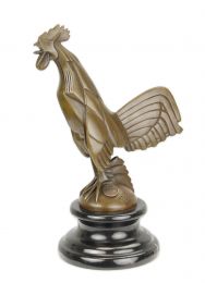 A BRONZE CAR MASCOT OF A ROOSTER