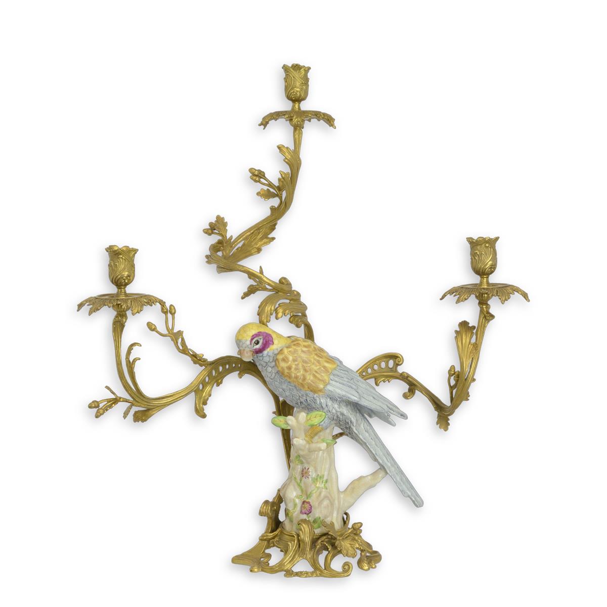 A THREE-BRANCH BRONZE MOUNTED PORCELAIN PARROT CANDLE HOLDER
