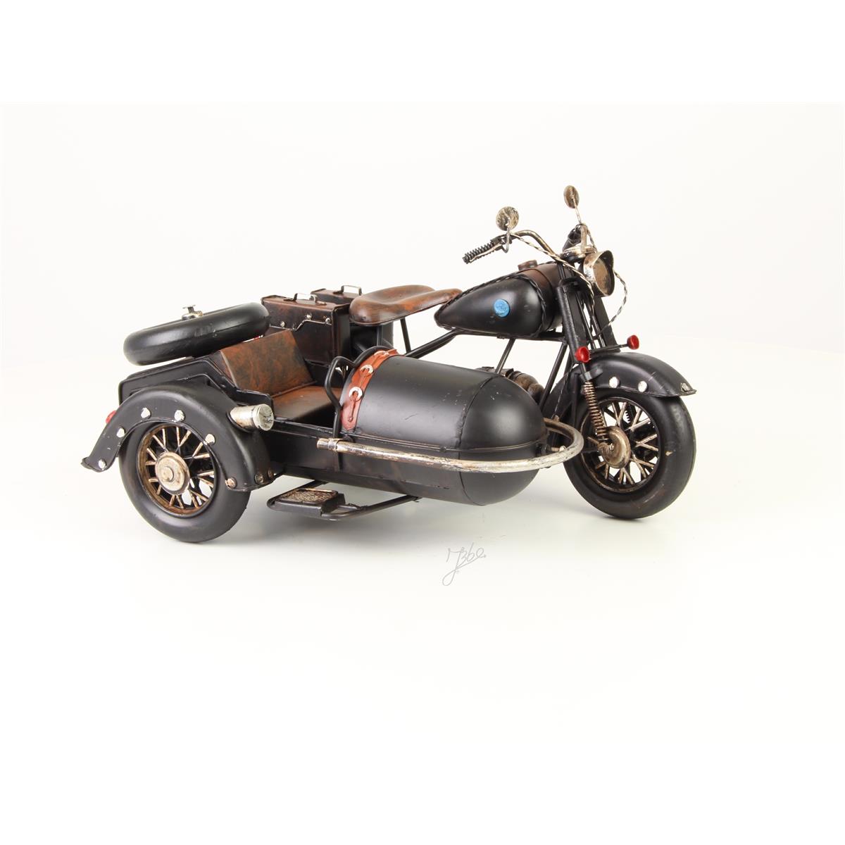 A TIN MODEL OF A MOTORCYCLE WITH SIDECAR
